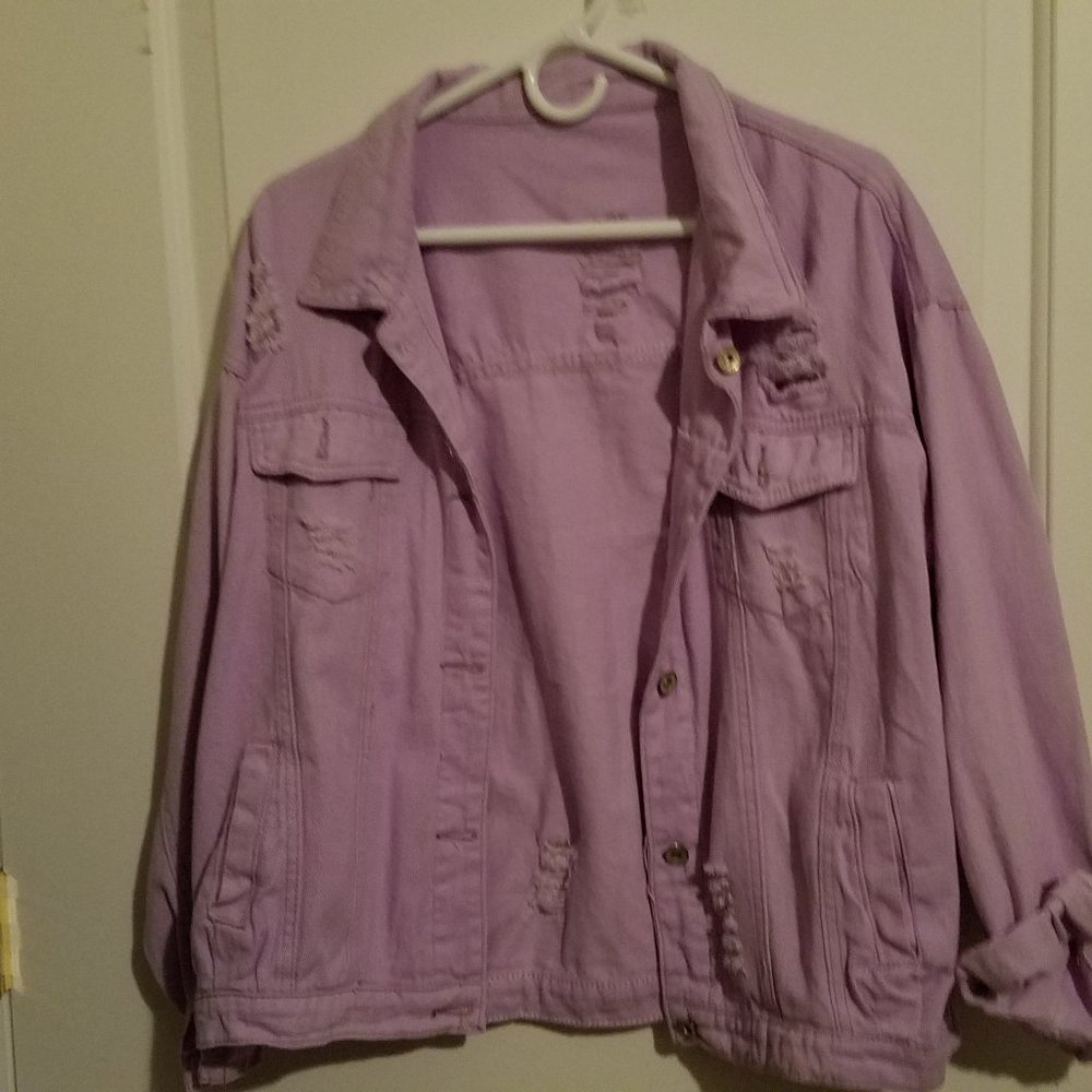 Denim jacket in lilac color 100% cotton.